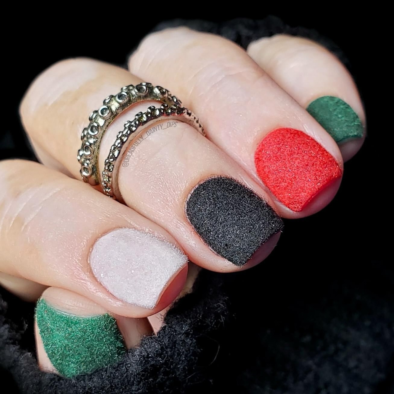 Close-up of hands with fall nail design having Fuzzy Texture Techniques