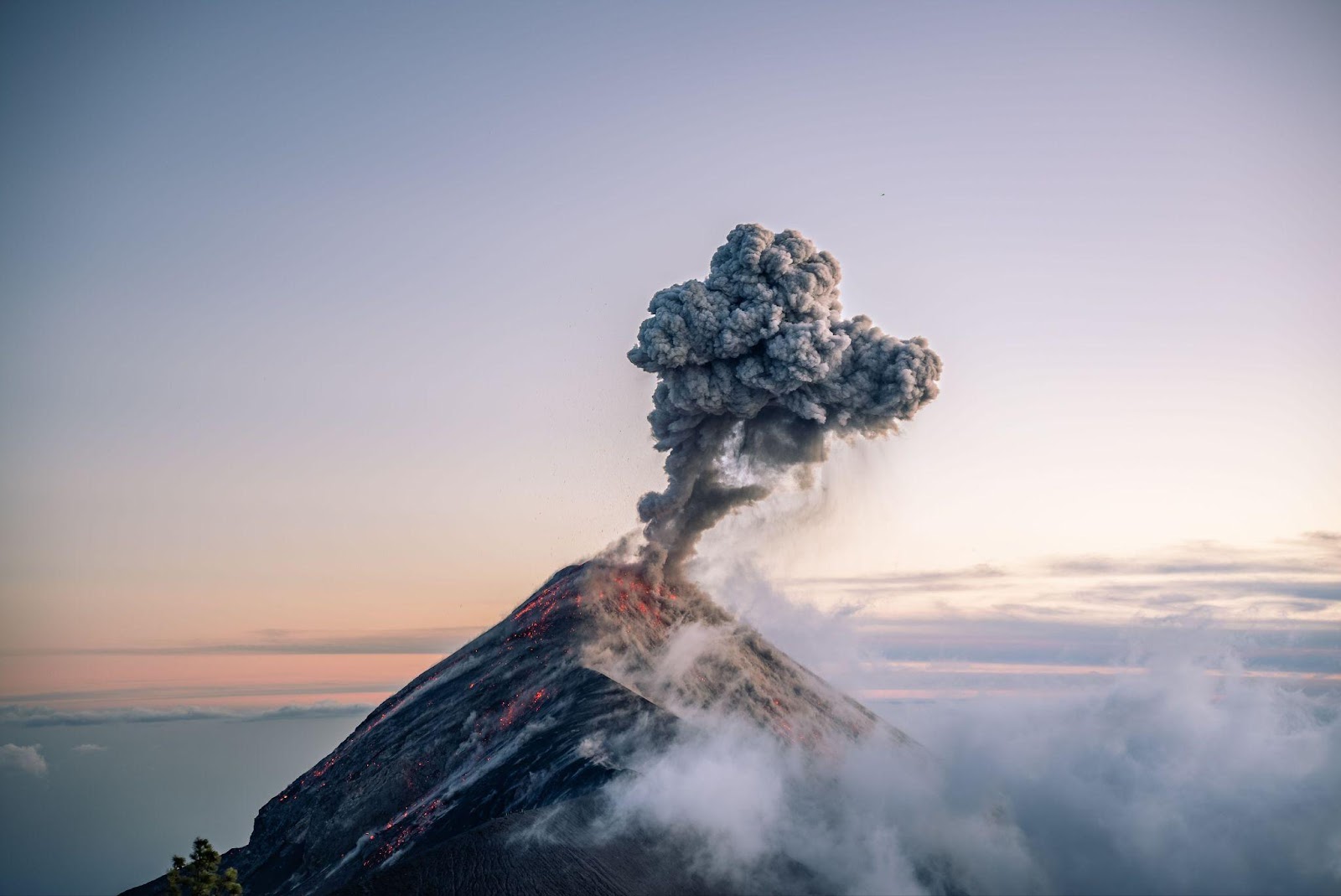 volcanic mountain spewing smoke