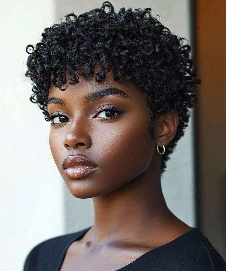 a pretty girl rocking an afro pixie
