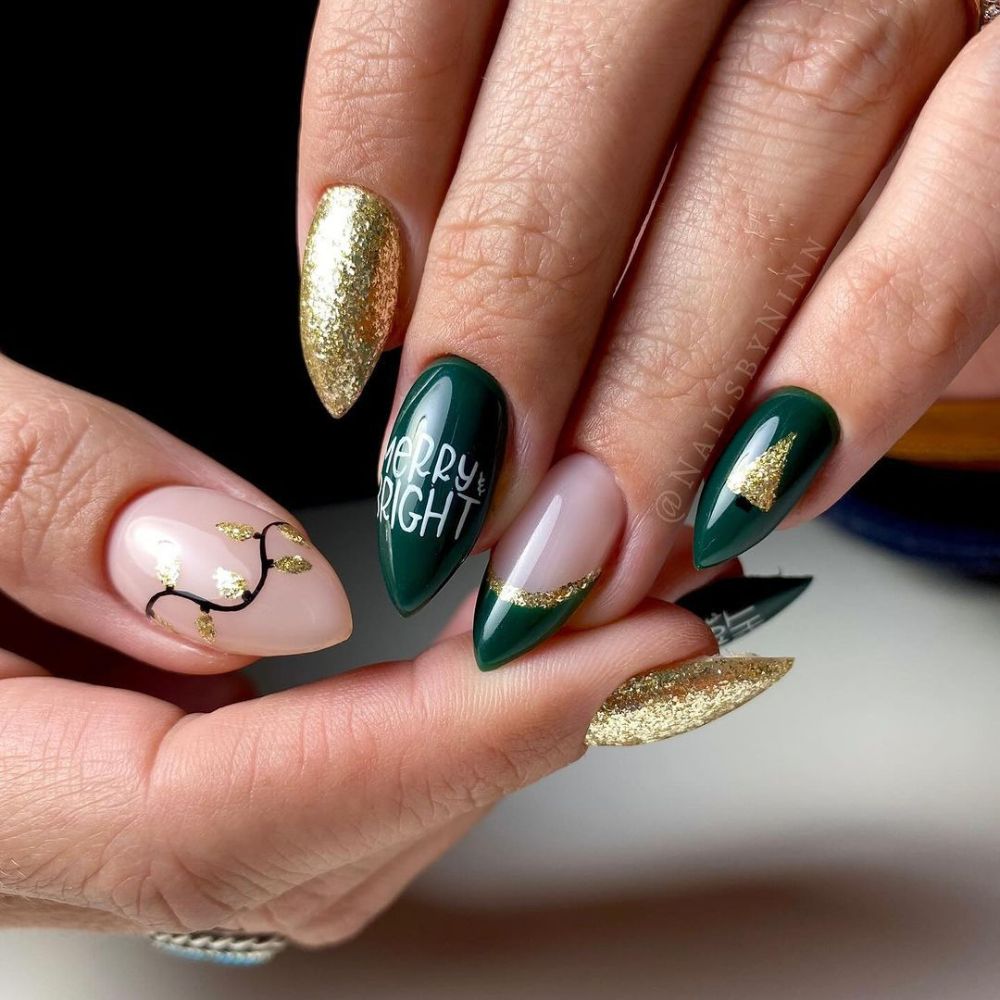 Close up of hands with Christmas Green Nails having  Twinkling Christmas Lights