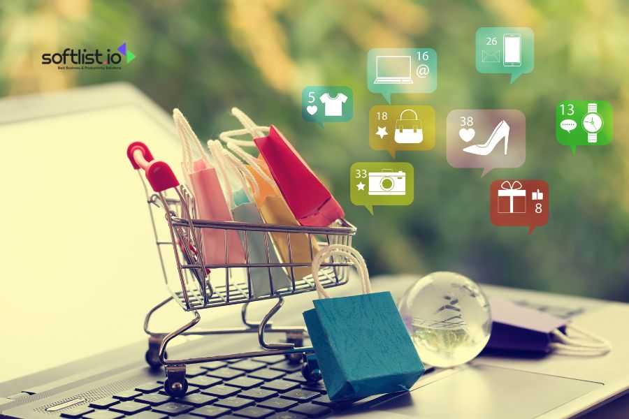 Mini shopping cart with colorful bags on a laptop.