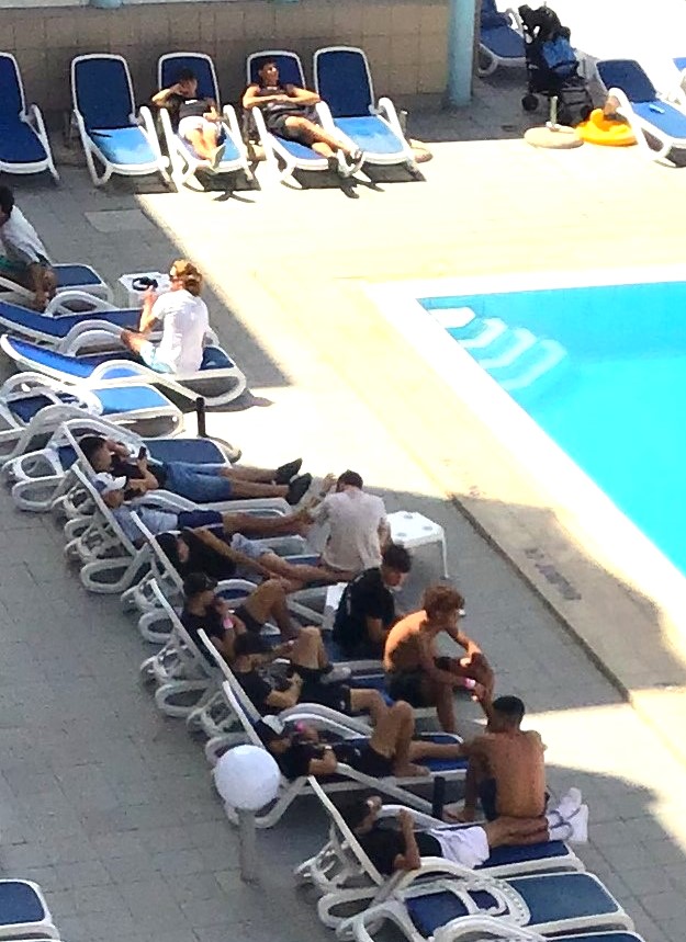 Lots of gays come to Malta during Pride week including these guys around the hotel swimming pool