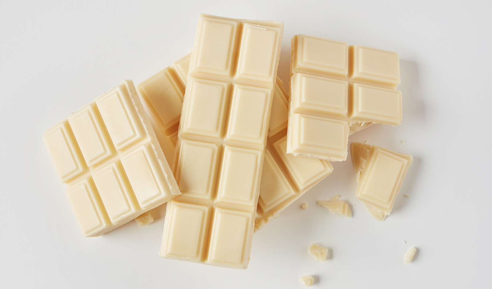 A white chocolate bar questioning its chocolate status