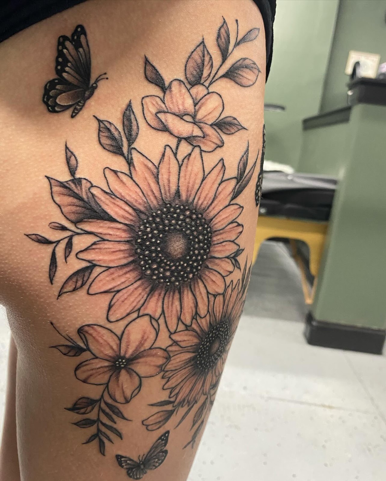 Sunflower Thigh Tattoo