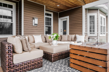 features to upgrade your home addition sunroom with sofas and fire table custom built michigan