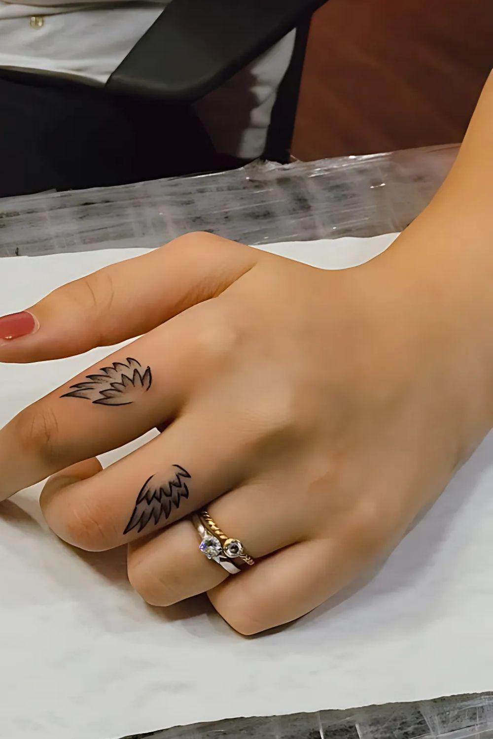 Wings Finger Tattoo