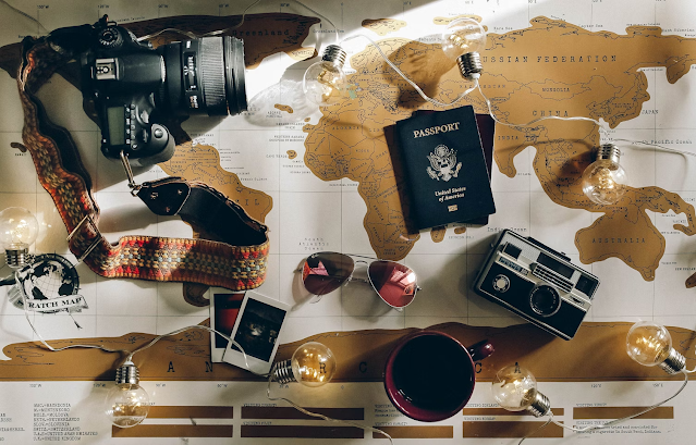 a world map with planning items on top of it
