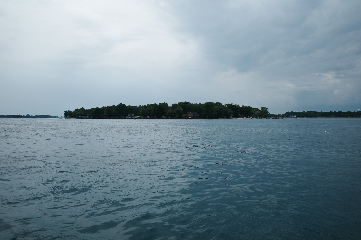 View of lake houses across the water in Algonac.