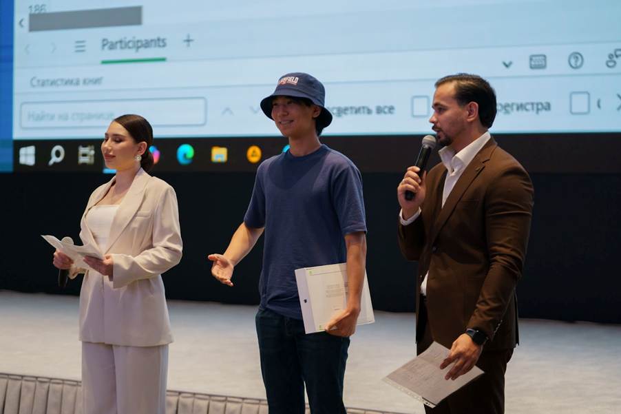 A group of people standing on a stageAI-generated content may be incorrect.
