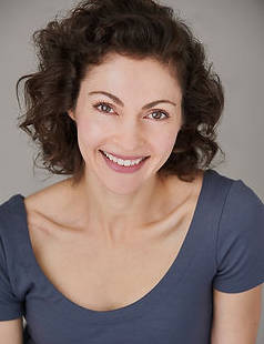 A close-up of a person smiling

Description automatically generated