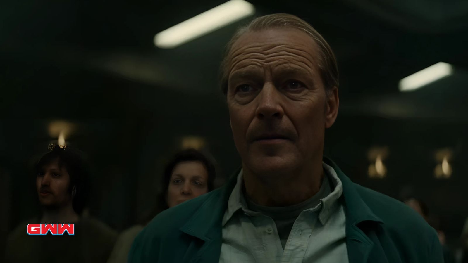 Iain Glen as Dr. Pete Nichols looking concerned in Silo Season 2.