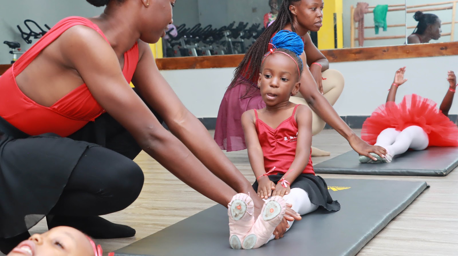 Leotard Ballet Trainers instructing a learner on the different ballet tips for beginners