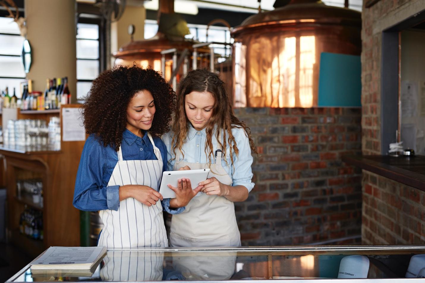 Women looking at tablet