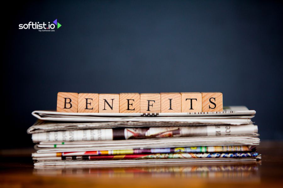 Scrabble tiles spelling "Benefits" on top of stacked newspapers.