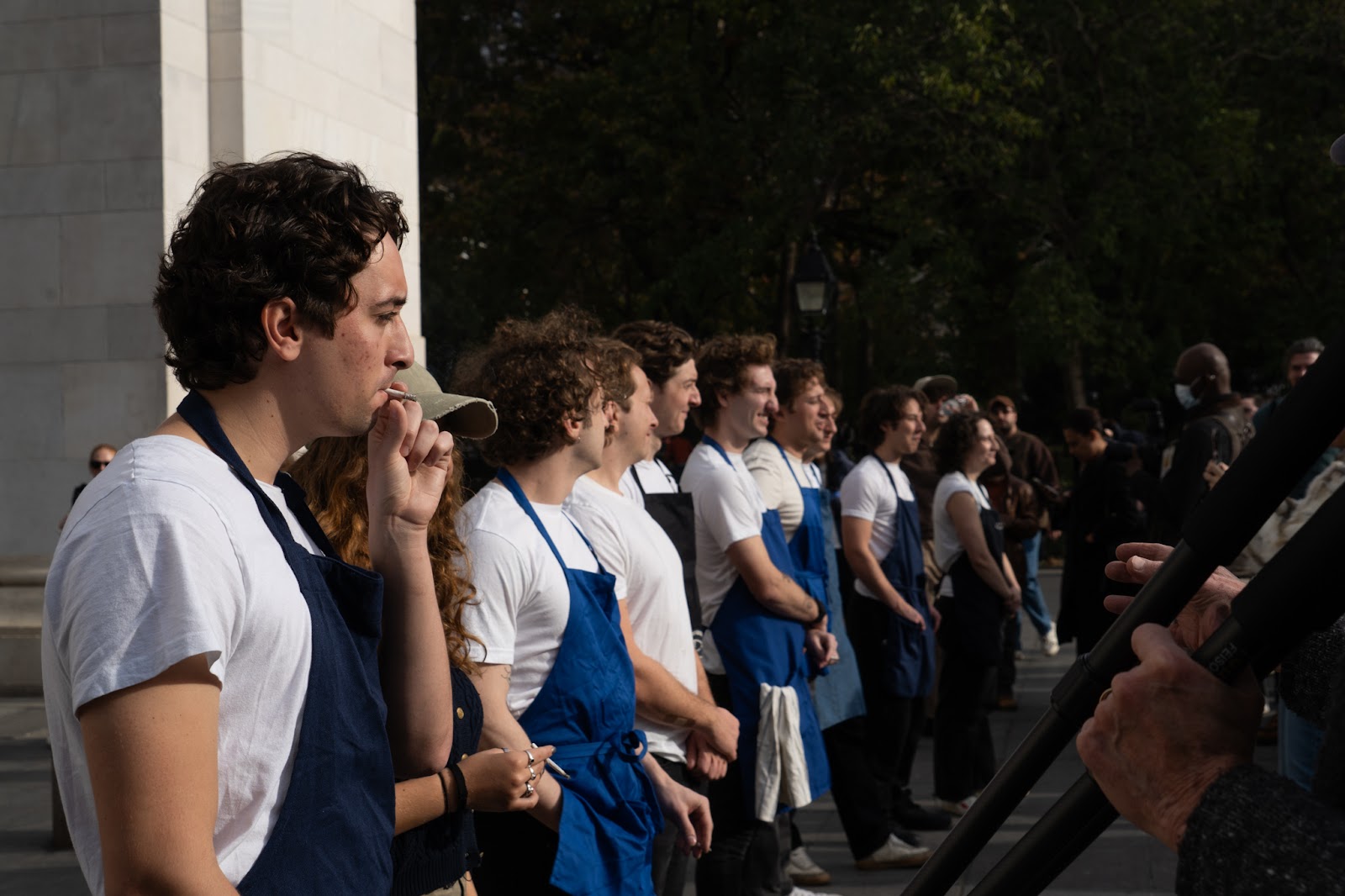 An image of the contestants at the Jeremy Allen White look-alike contest lining up. 
