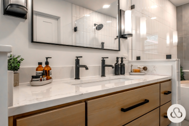 how to select the perfect countertops for your bathroom remodel quartz countertop vanity with matte black faucets and rectangular mirror custom built michigan
