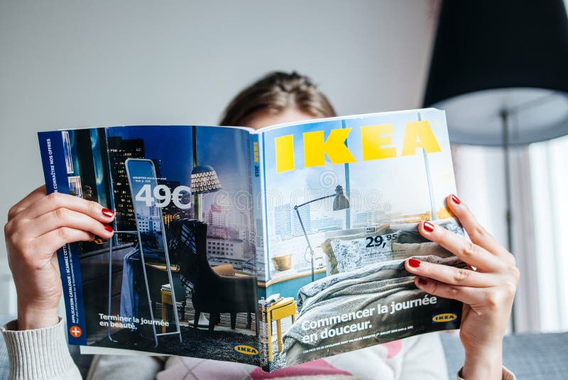 Reading IKEA Catalogue editorial image. Image of blue - 51129360