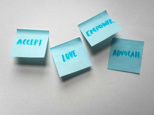 postit notes saying accept empower