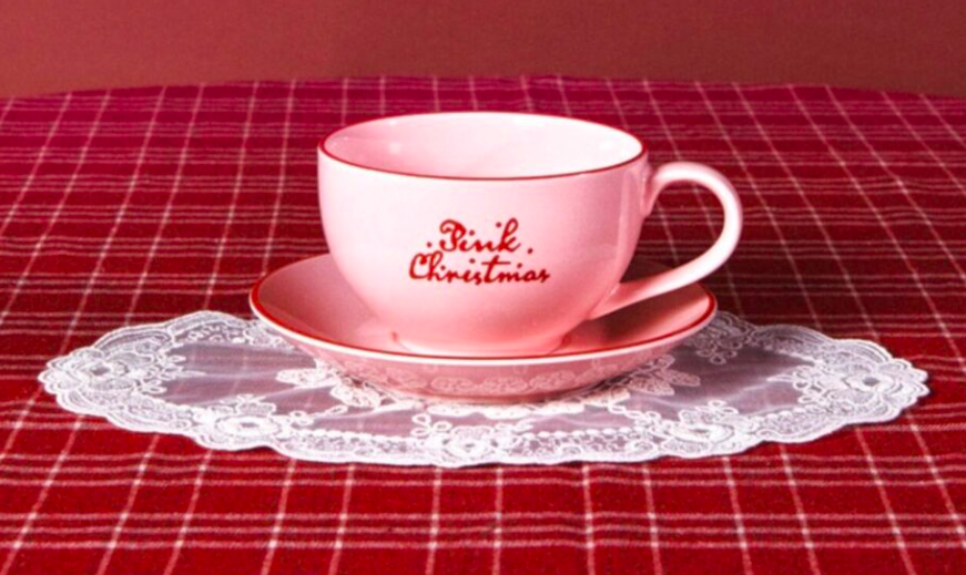 This contains an image of a Pink Christmas Cup and Saucer Set