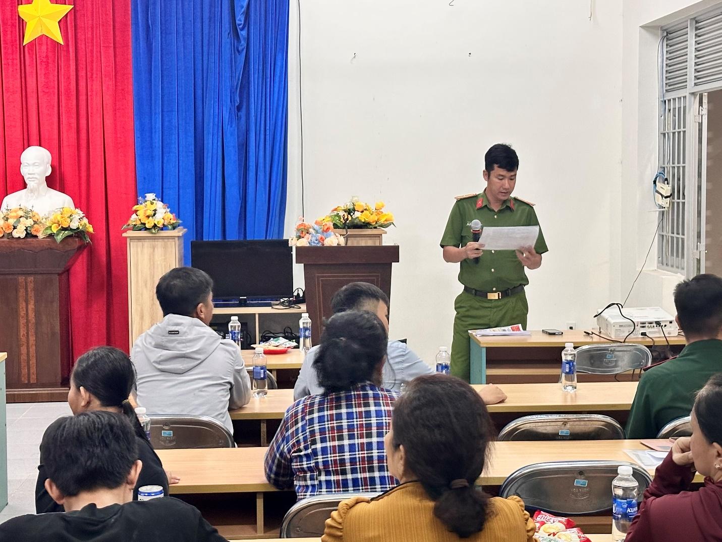 A person in uniform standing in front of a group of peopleDescription automatically generated