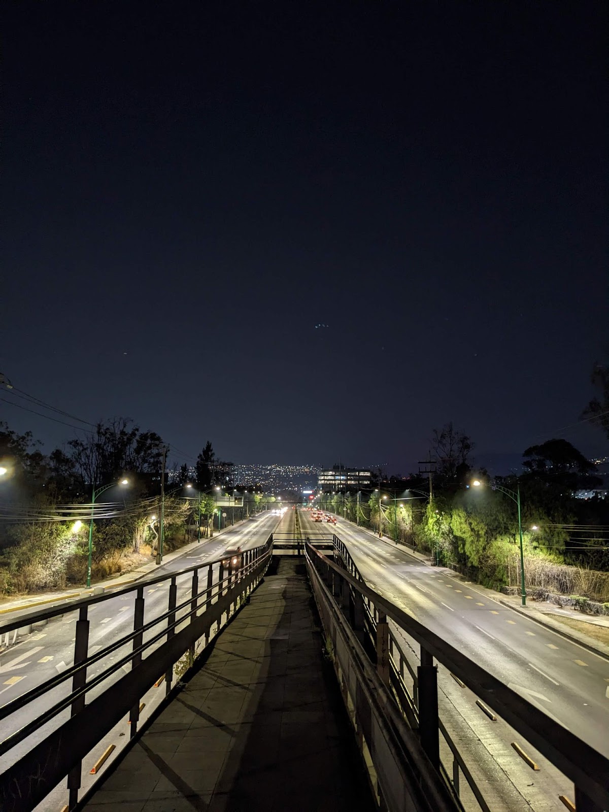 the pedestrian bridge to the metro leaving camino verde, the gay cruising and hookup forest in Mexico City