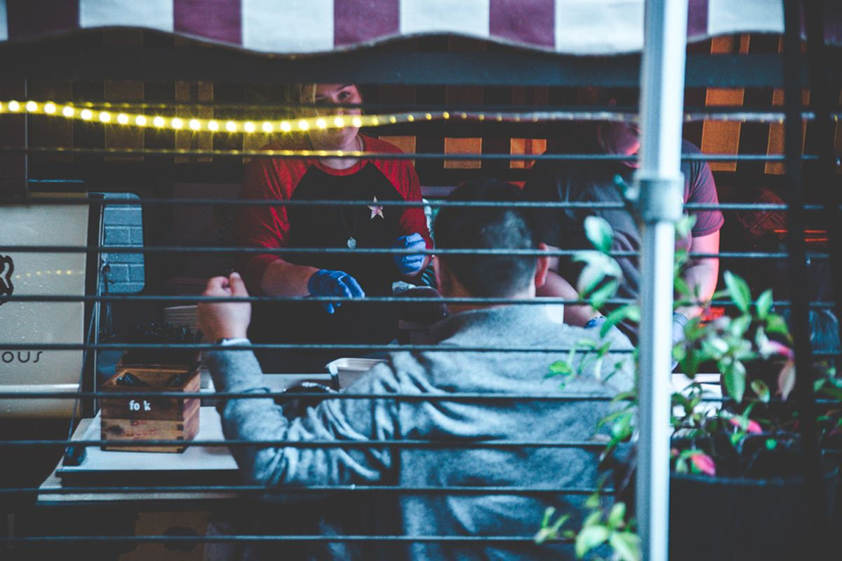 Food truck Pulls up and sets up to get your dinner ready for you - Elopement Photography