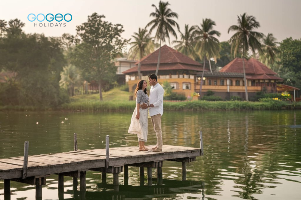 a Married couple standing on a bridge