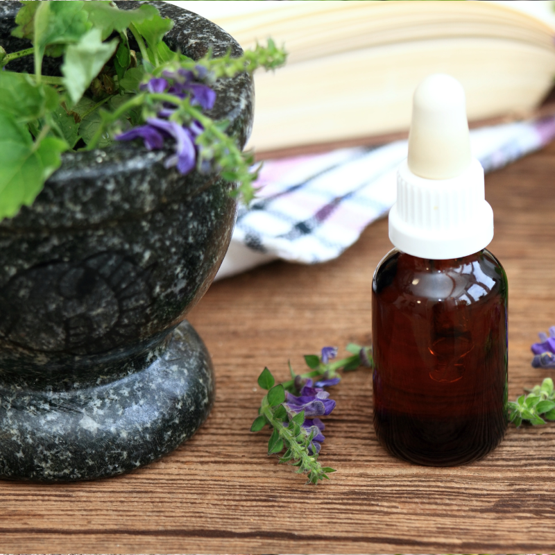 A collection of essential oils for anxiety, highlighting Skullcap (Scutellaria lateriflora) for relaxation.