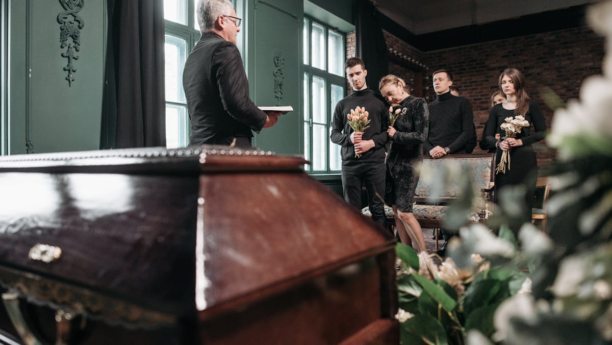 a man facilitating a funeral