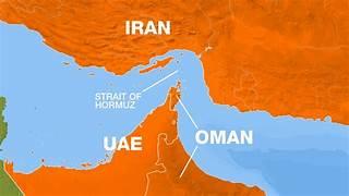 An orange and blue map with white text with Strait of Hormuz in the background

AI-generated content may be incorrect.