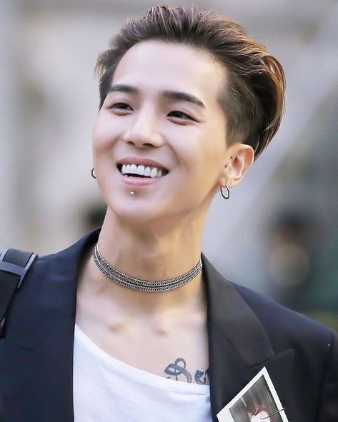 This contains an image of WINNER Mino  