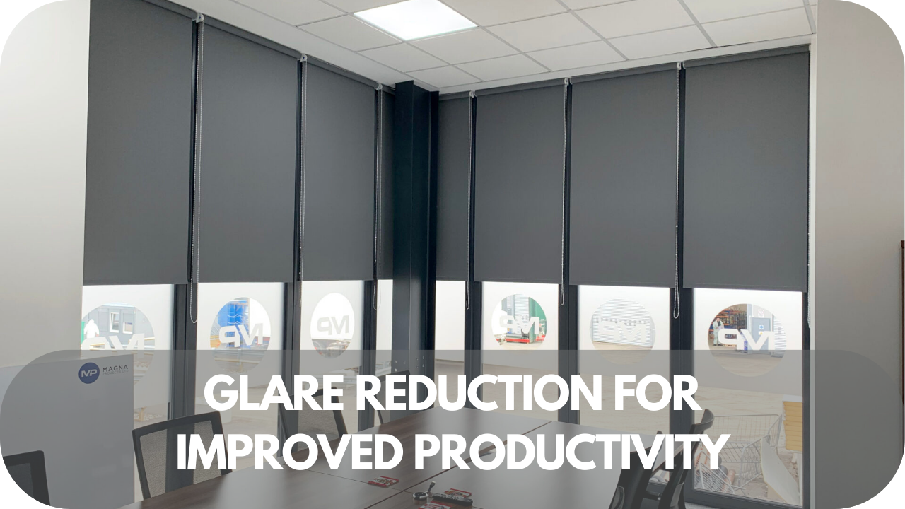 Office roller blinds reducing screen glare, creating a comfortable work environment for improved productivity.