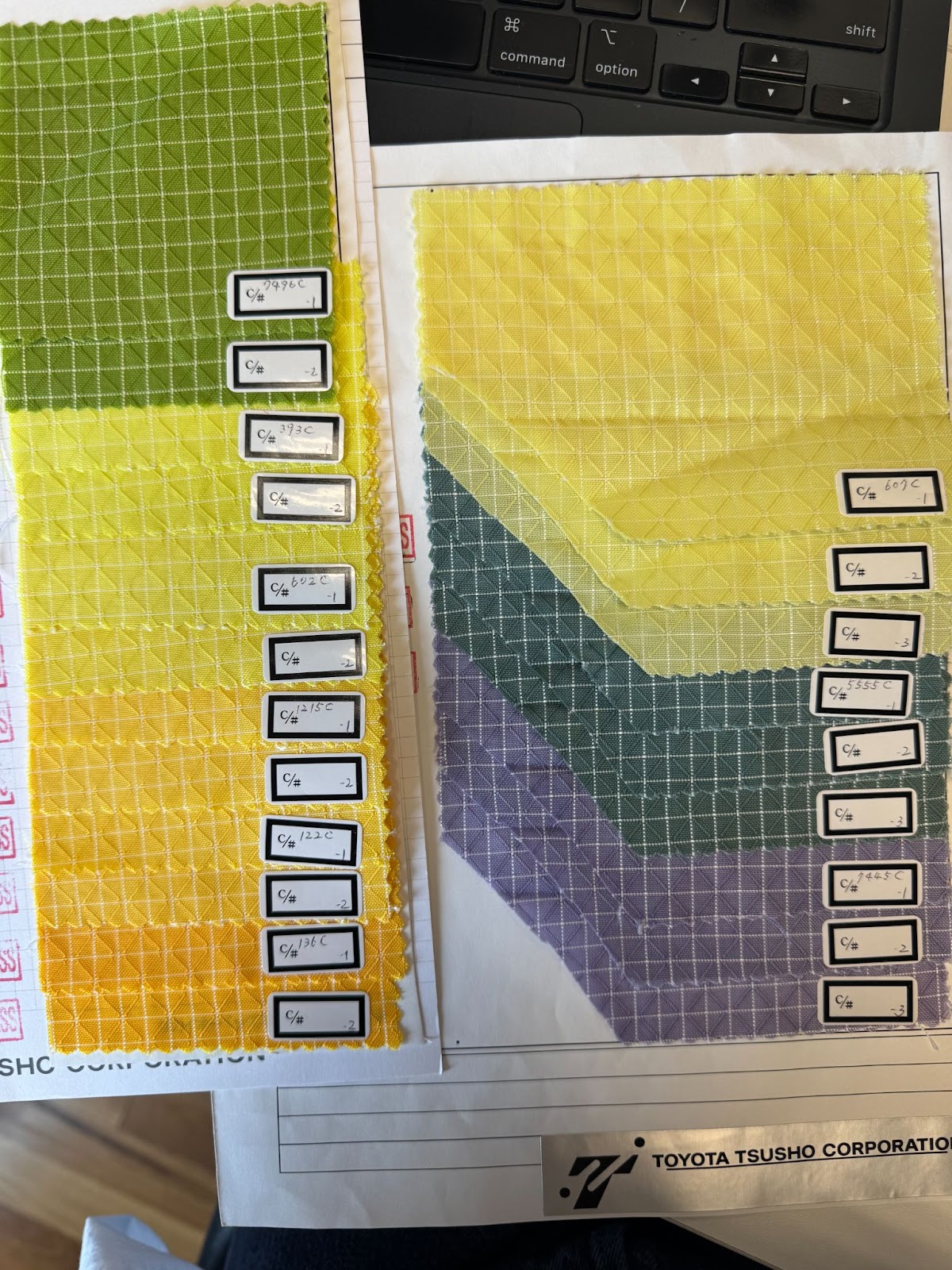 A collection of 200d Halcyon samples in green, yellow, and purple