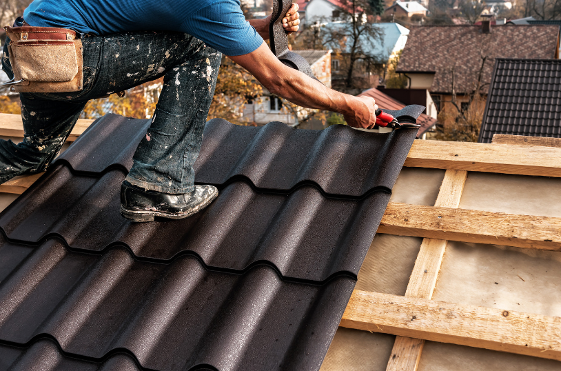 a man fixing the roof