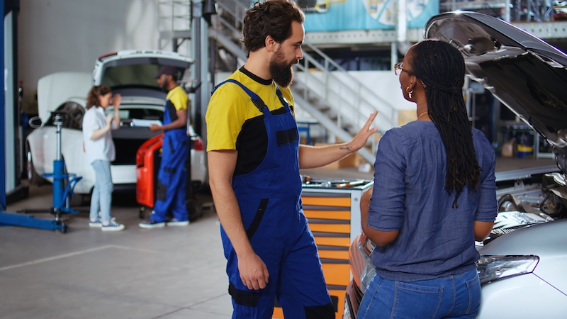 Staffing Strategies, garage employees talking to customers.