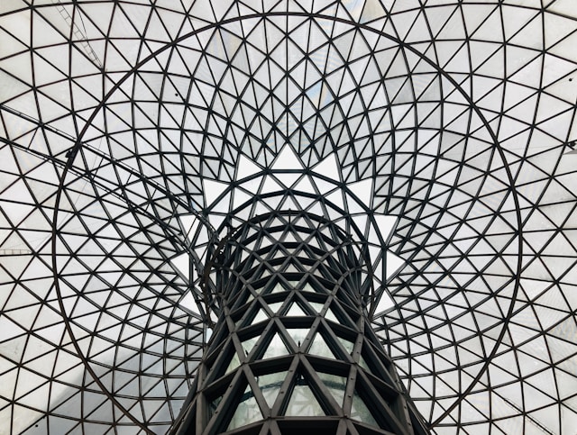 The view shows a parametric design structure. It is a geometric, glass and steel dome structure, featuring a circular pattern with interconnected triangular panels.