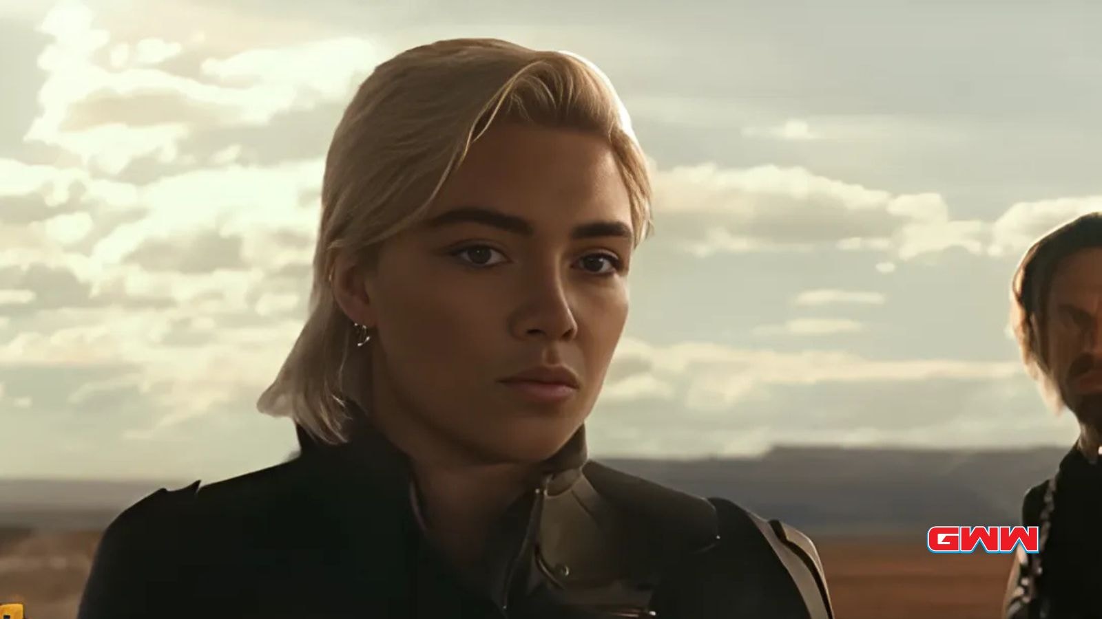 Florence Pugh as Yelena Belova looking serious against a desert backdrop