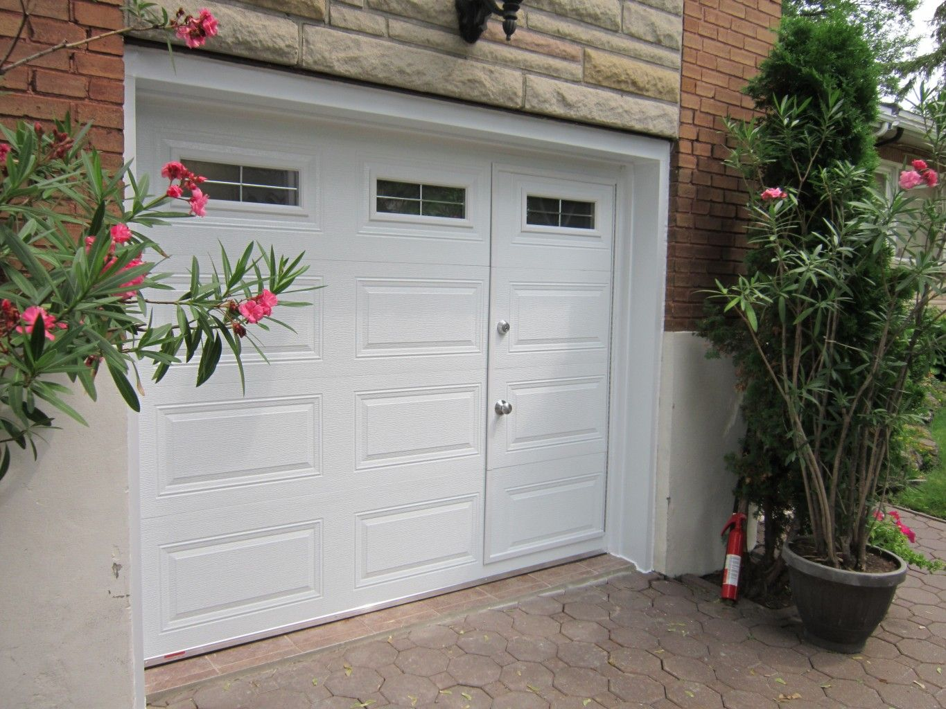 garage door with pedestrian door