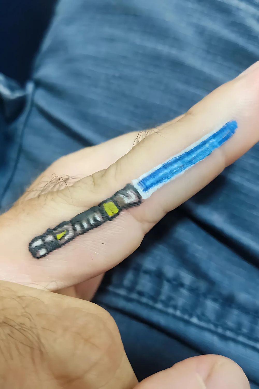 Lightsaber Finger Tattoo