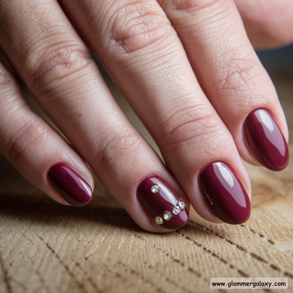 Classy Fall Nails having Maroon Nails with Gems