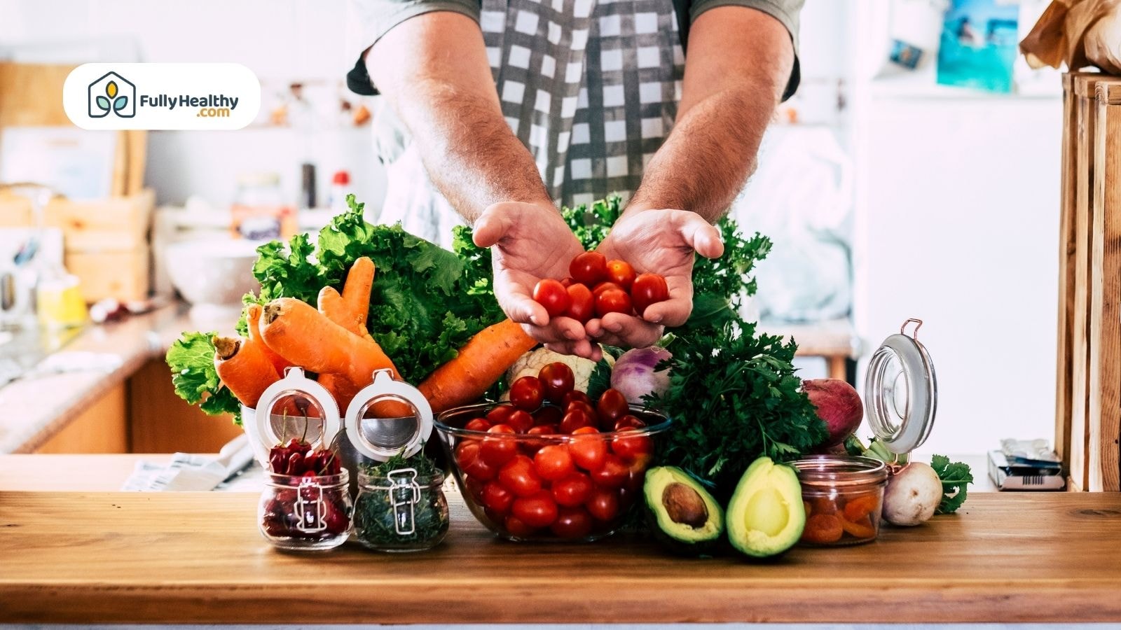 Person holding cherry tomatoes above fresh vegetables on table