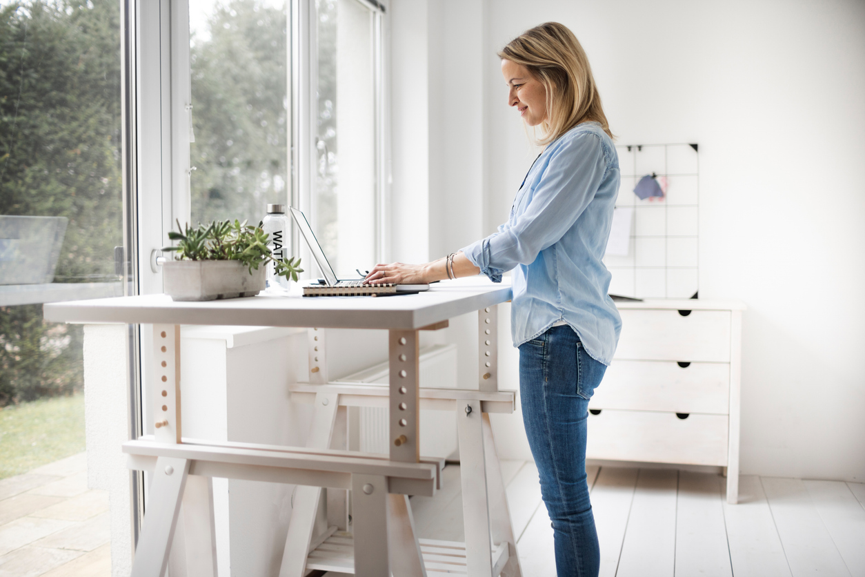 a girl working at her standing desk