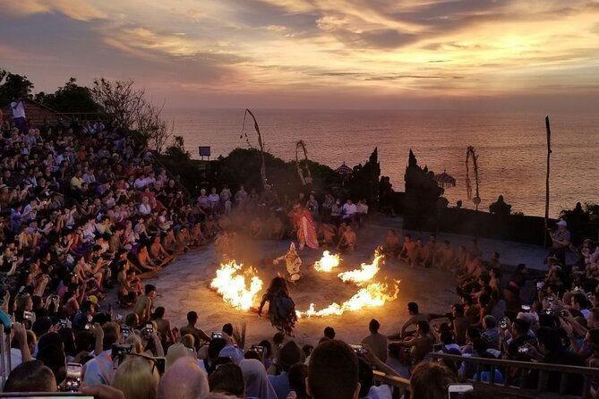 A group of people watching a fire show

AI-generated content may be incorrect.