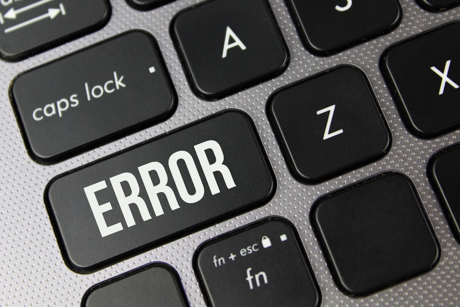 Word “error” on a computer keyboard. 