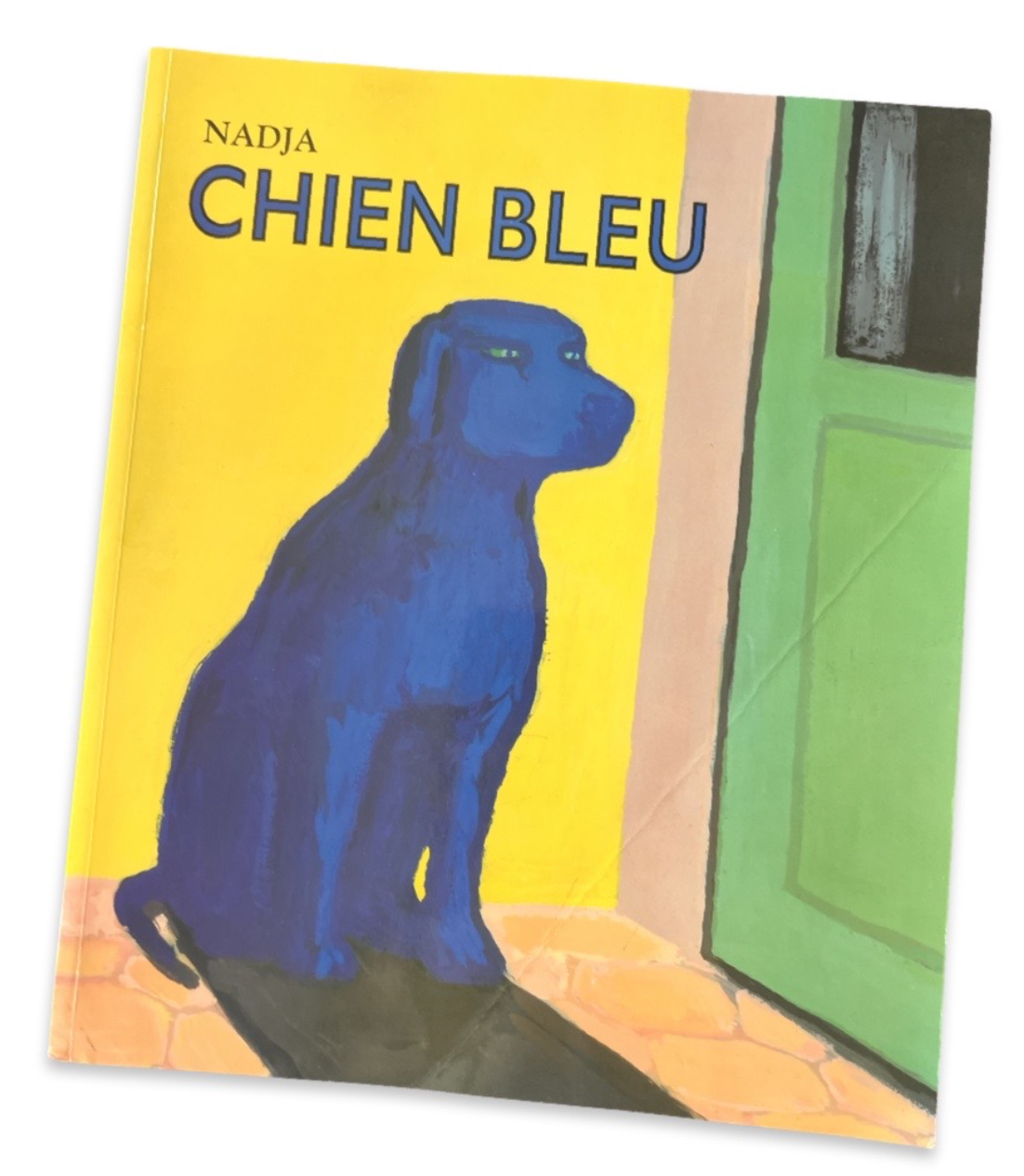 A book cover with a blue dog

Description automatically generated