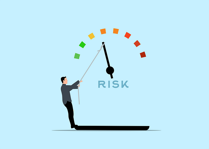 A person holding a stick to a scale Description automatically generated