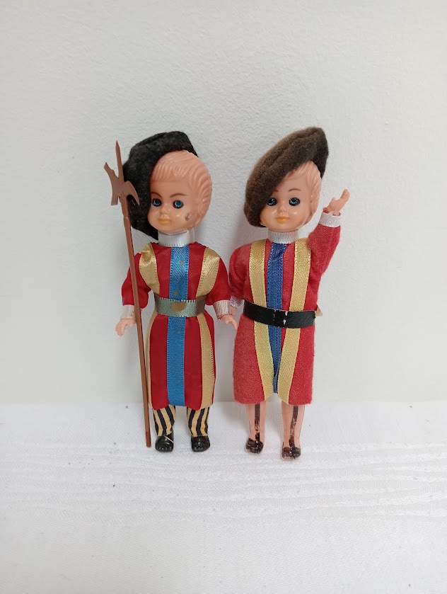 Two small Vatican Swiss guard dolls
