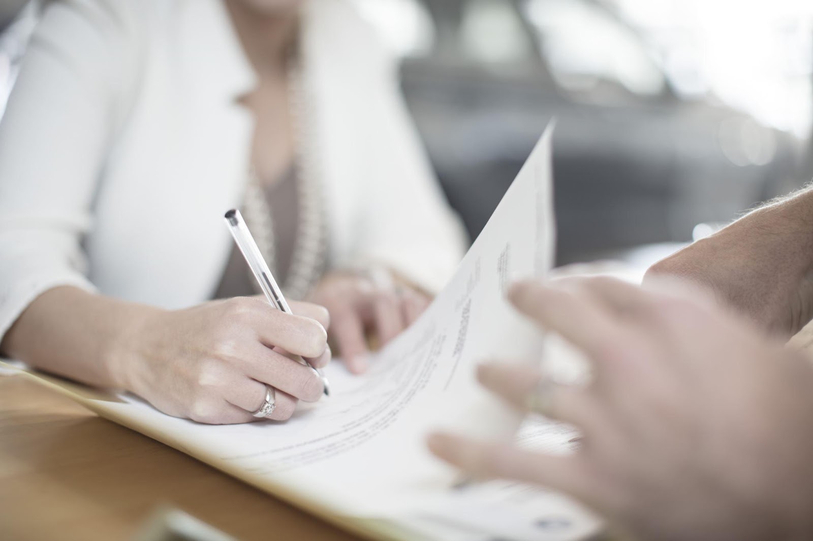 Woman signing contract