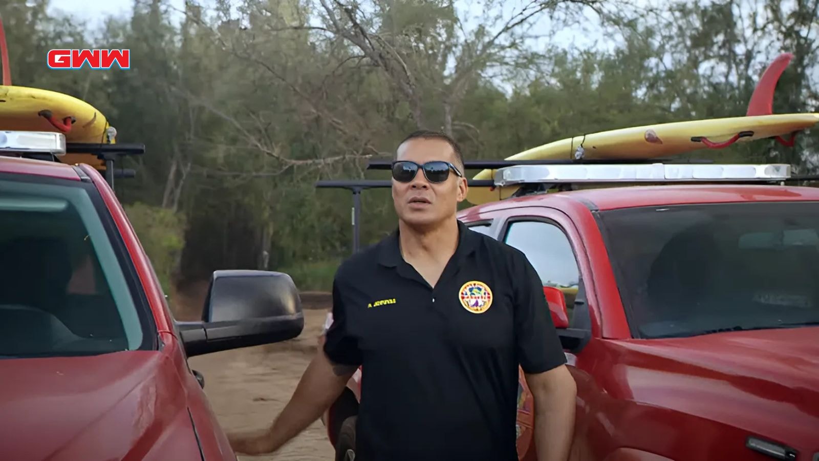 Robbie Magasiva as Sonny Jennings with rescue trucks in Rescue Hi Surf