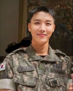 This contain an image of BTS J-HOPE on uniform 